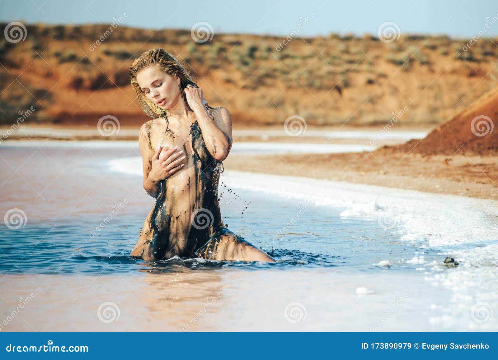 naked in mud