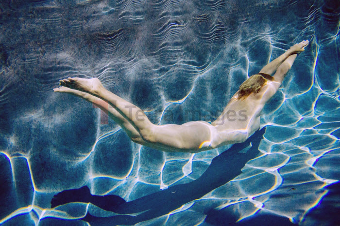 women naked in swimming pool