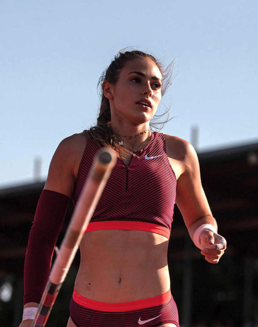 Sexy Pole Vaulter pie eating