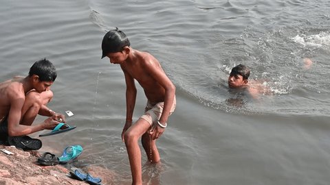 alexander teves recommends naked indian bathing pic