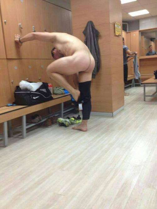 men undressing in locker room