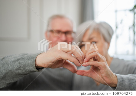 elderly couple making love