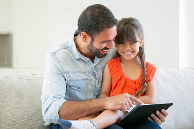 Best of Daughter sits on dads lap