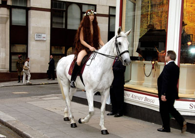 adebayo adebisi add naked woman on horseback photo