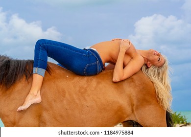 nude women on horseback